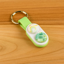 2-in-1 Magnetic Push Pop Keychain Toy the24kgal