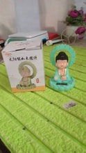 Plastic Solar Powered Moving Head Sitting Action Buddha Statue (1 Pc / Mix Color) the24kgal